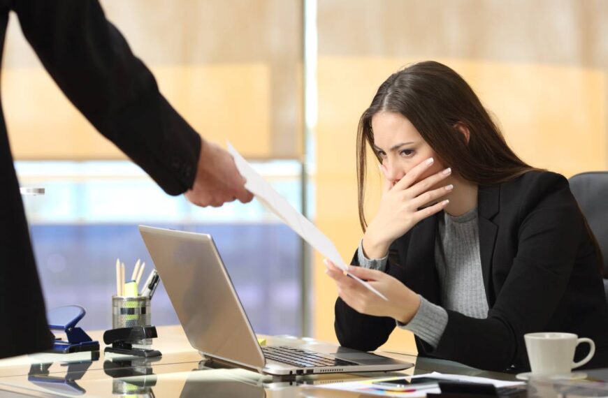 Worried businesswoman receiving notification